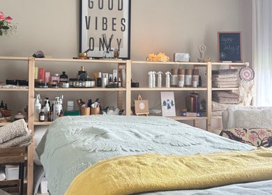 Relaxing spa room at Ataraxy with Abby, Blantyre, Scotland, GB featuring a cozy massage table and calming decor.