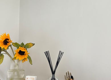 Elegant sunflowers and diffuser at Ataraxy with Abby, Blantyre, Scotland, GB create a serene ambiance.