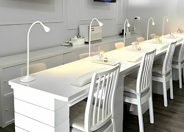 Modern nail stations at Max Studio Nails and More in Highwood, Illinois, US, showcasing elegant and sleek design.