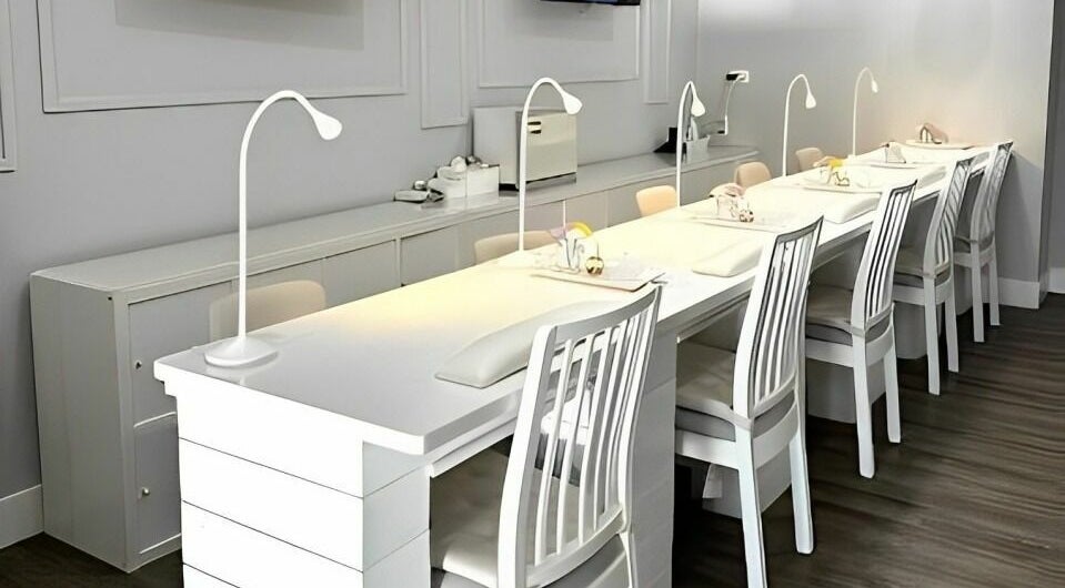 Modern nail stations at Max Studio Nails and More in Highwood, Illinois, US, showcasing elegant and sleek design.