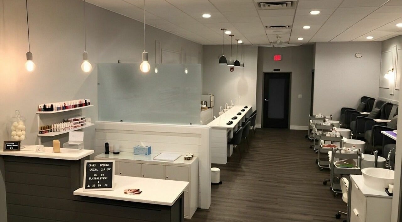 Elegant interior of Max Studio Nails and More in Highwood, Illinois, US, showcasing modern nail service stations.