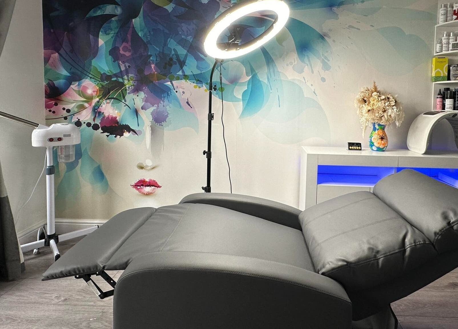 Luxurious treatment room at AR Beauty Bar, Stevenage, England, GB featuring modern decor and a comfortable chair.