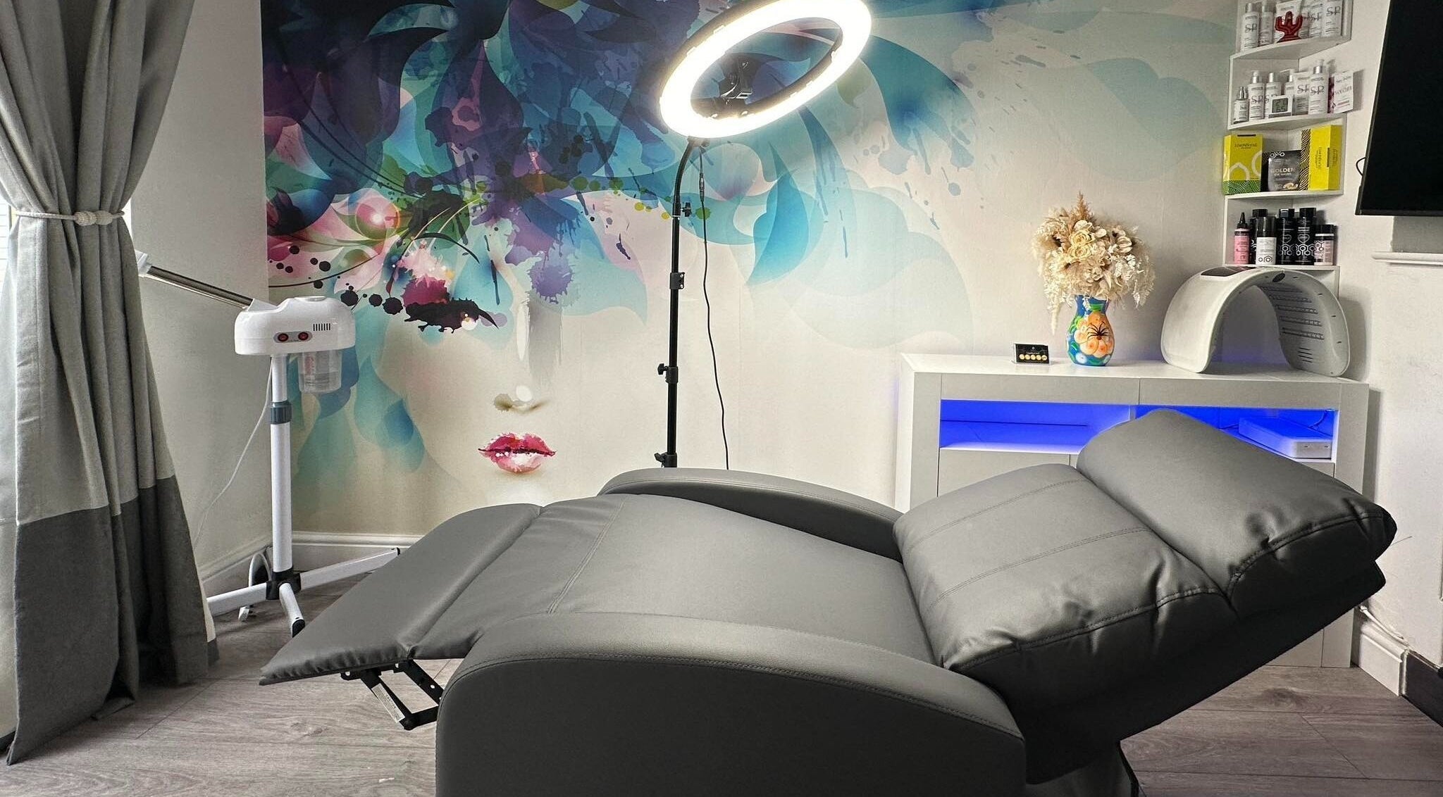Luxurious treatment room at AR Beauty Bar, Stevenage, England, GB featuring modern decor and a comfortable chair.