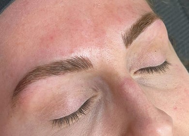 Groomed eyebrows at Arch Rivals Brow Studio, Port Coquitlam, British Columbia, CA. Close-up view.