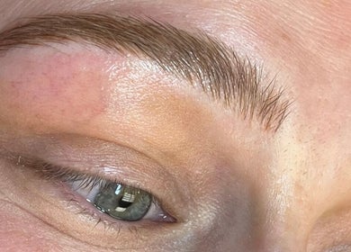 Detailed view of expertly shaped eyebrows at Arch Rivals Brow Studio, Port Coquitlam, British Columbia, CA.
