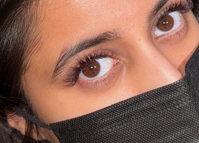 Close-up of elegant eye makeup at RS BEAUTY, Birmingham, England, GB, showcasing natural lash extensions.