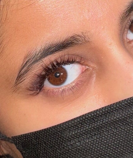 Close-up of elegant eye makeup at RS BEAUTY, Birmingham, England, GB, showcasing natural lash extensions.