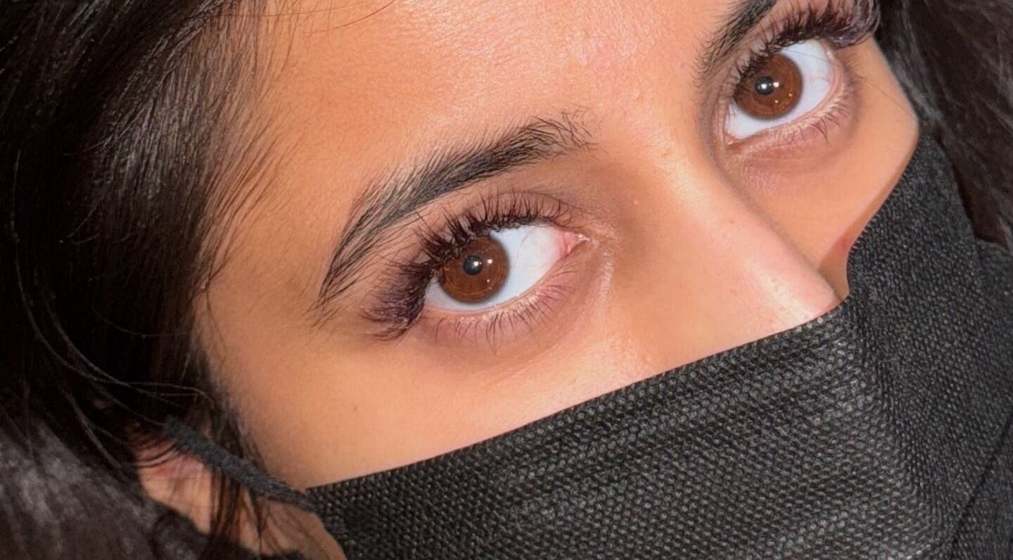 Close-up of elegant eye makeup at RS BEAUTY, Birmingham, England, GB, showcasing natural lash extensions.