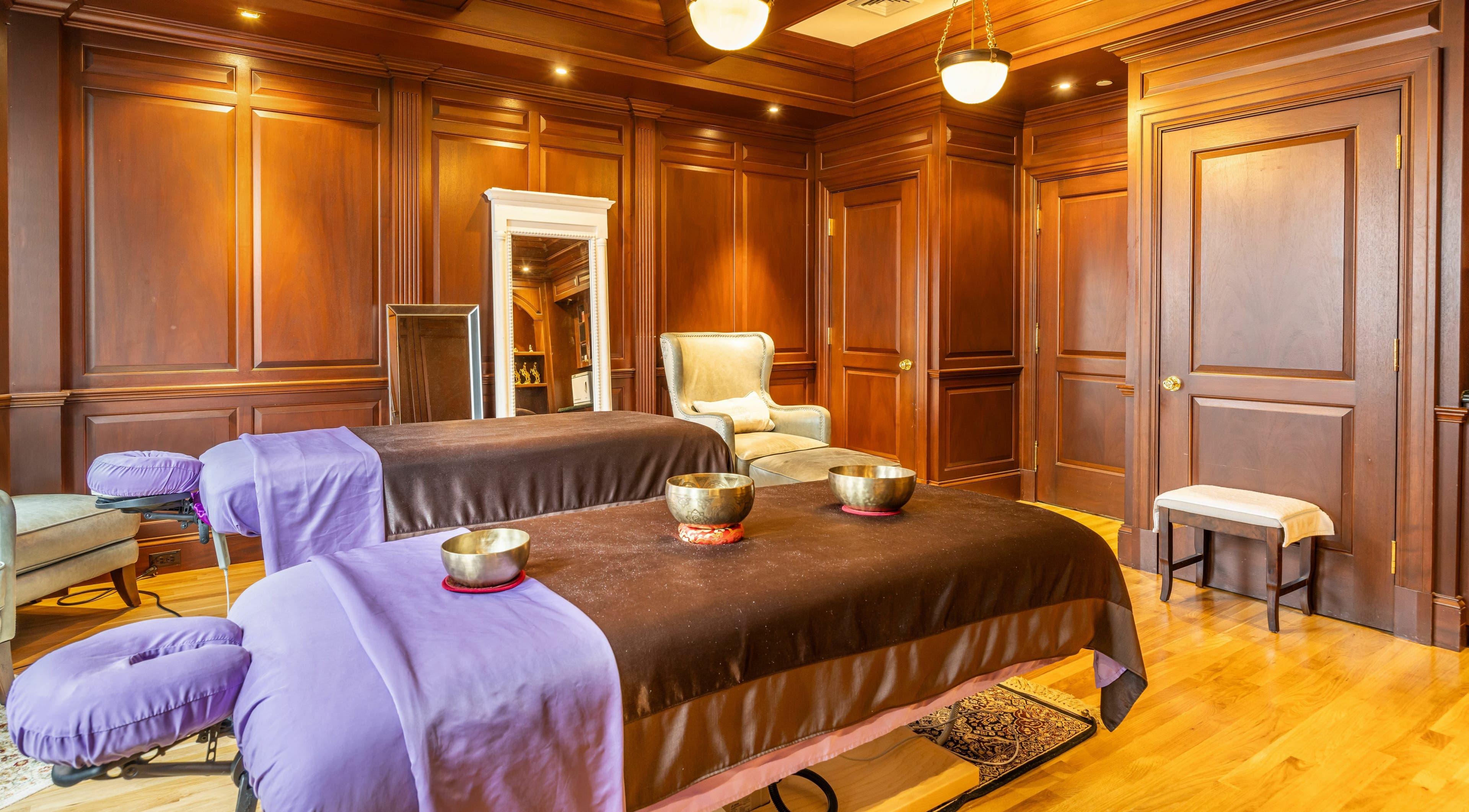 Elegant massage room at Wellness Therapeutic Massage LLC, Boston, Massachusetts, US with cozy ambiance.