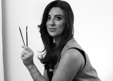 Professional beautician holding tools at J Sbrowbar Sydney, Winston Hills, New South Wales, AU.