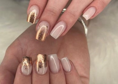 Elegant gold foil nails at Nails by Zanecke, Boksburg, Gauteng, ZA. Perfect blend of style and sophistication.