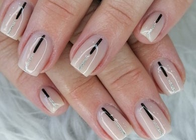 Chic nail art by Nails by Zanecke, Boksburg, Gauteng, ZA. Features black and silver lines on nude nails.