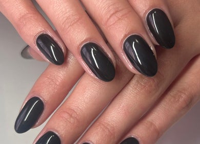 Stylish black manicure by Nails by Zanecke in Boksburg, Gauteng, ZA. Perfectly polished elegance.