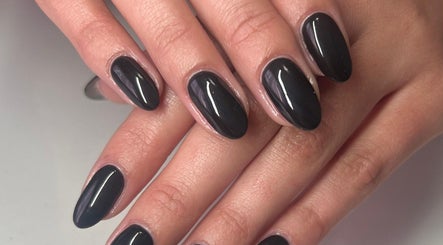 Stylish black manicure by Nails by Zanecke in Boksburg, Gauteng, ZA. Perfectly polished elegance.