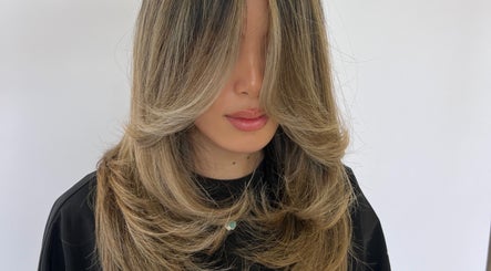 Blonde layered hairstyle at Estrella Salon, San Diego, California, US.