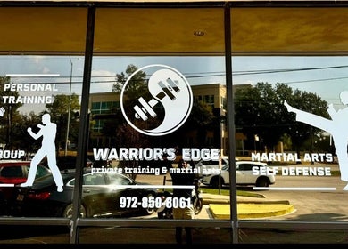 Front window display of Warrior’s Edge in Dallas, Texas, US with training and martial arts offerings.