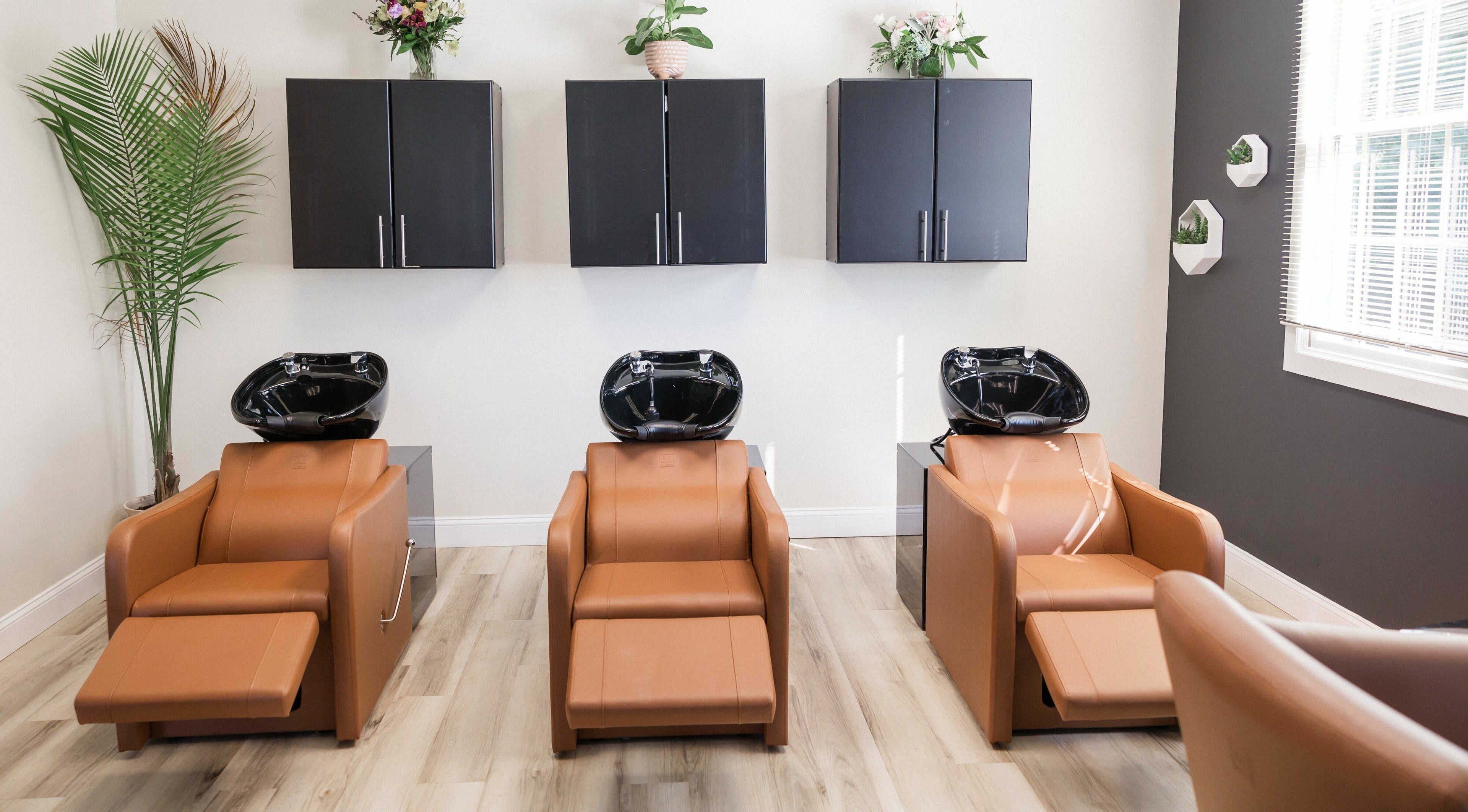 Relaxing salon wash stations at Bella Vita Salon in Lewisburg, West Virginia, US, with modern decor.