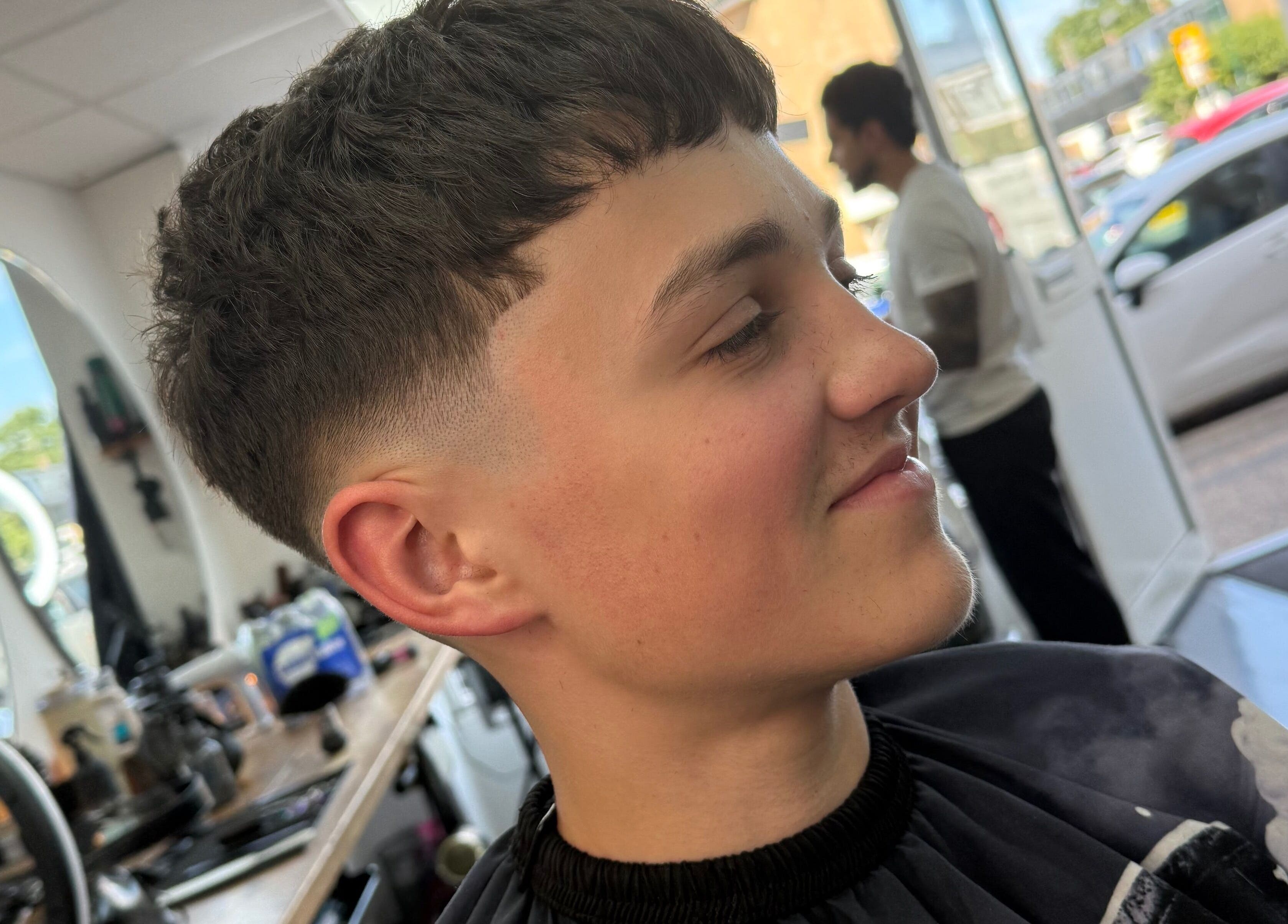 Fresh fade haircut at Eydmanns Barbering, Bognor Regis, England, GB, showcasing barbering expertise.