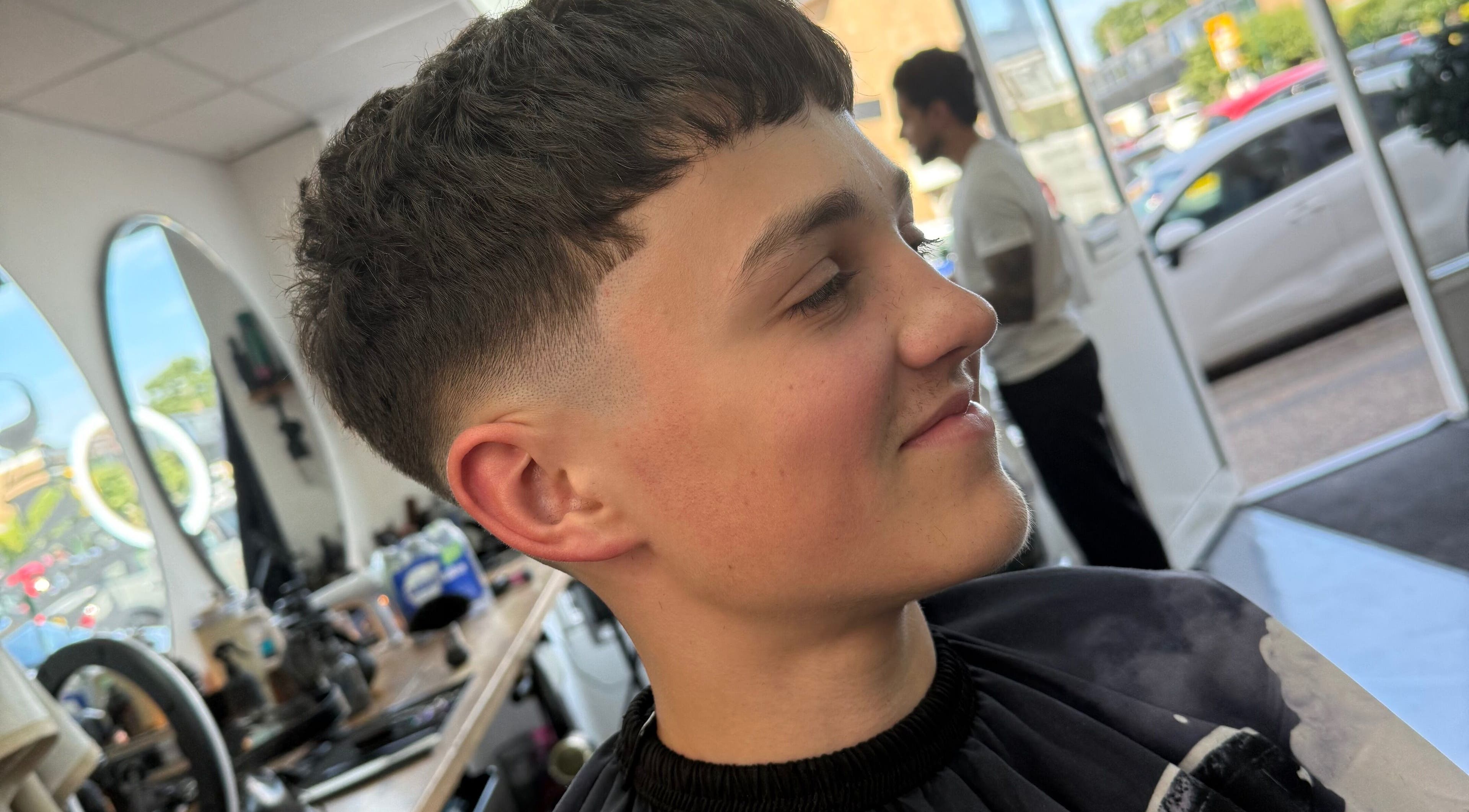 Fresh fade haircut at Eydmanns Barbering, Bognor Regis, England, GB, showcasing barbering expertise.