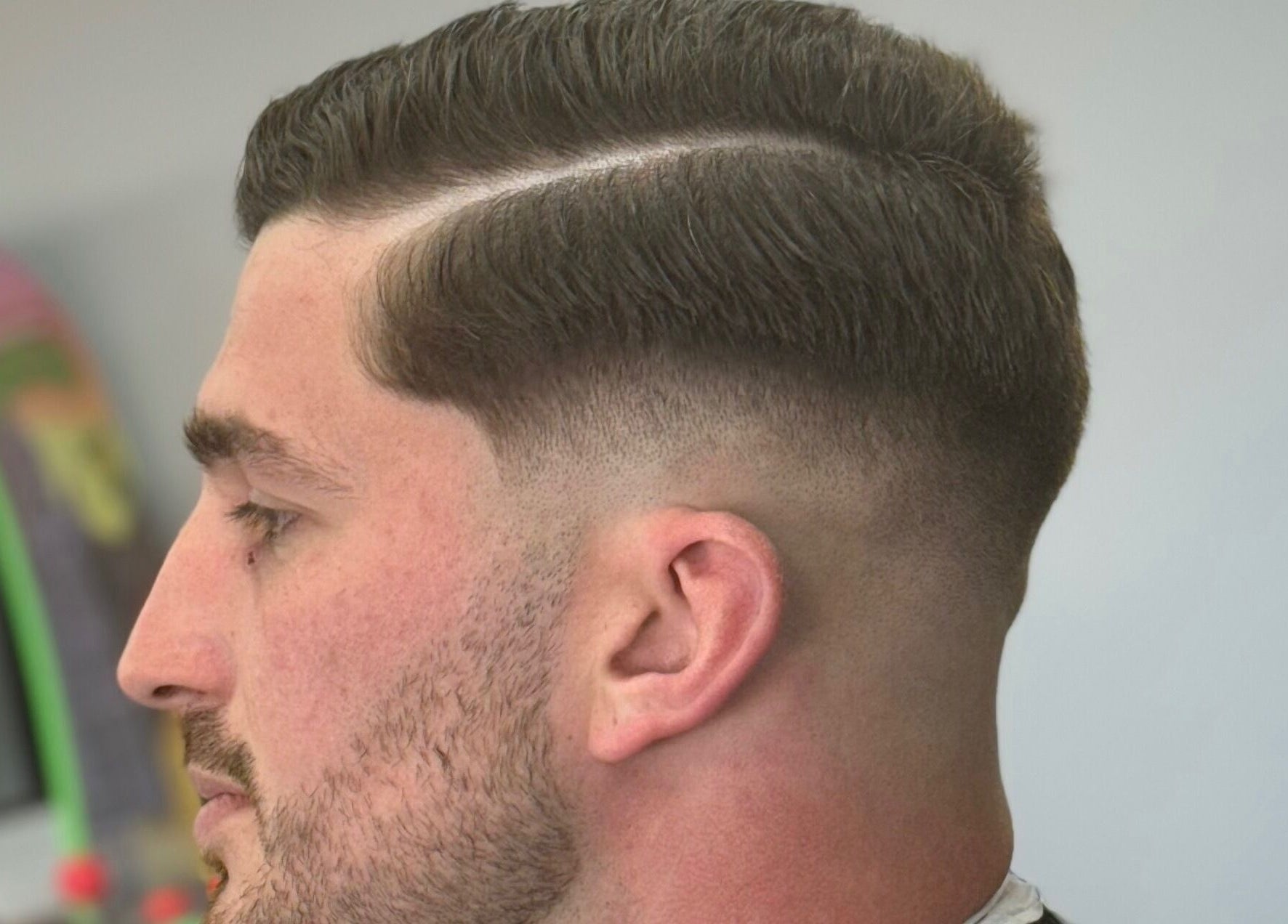 Close-up of classic fade hairstyle at Eydmanns Barbering, Bognor Regis, England, GB.