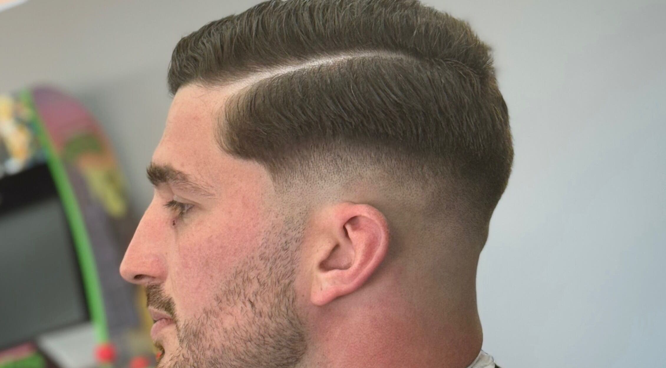 Close-up of classic fade hairstyle at Eydmanns Barbering, Bognor Regis, England, GB.