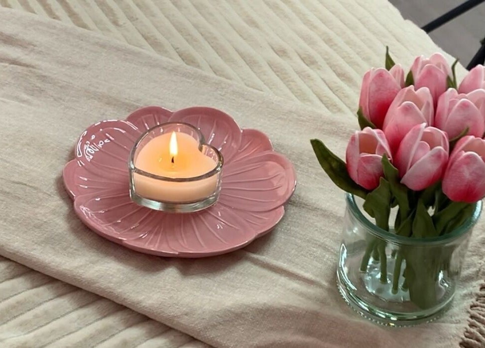 Cozy candle and tulips setting at Skin Luminosity by Lydia in Southend on Sea, England, GB.