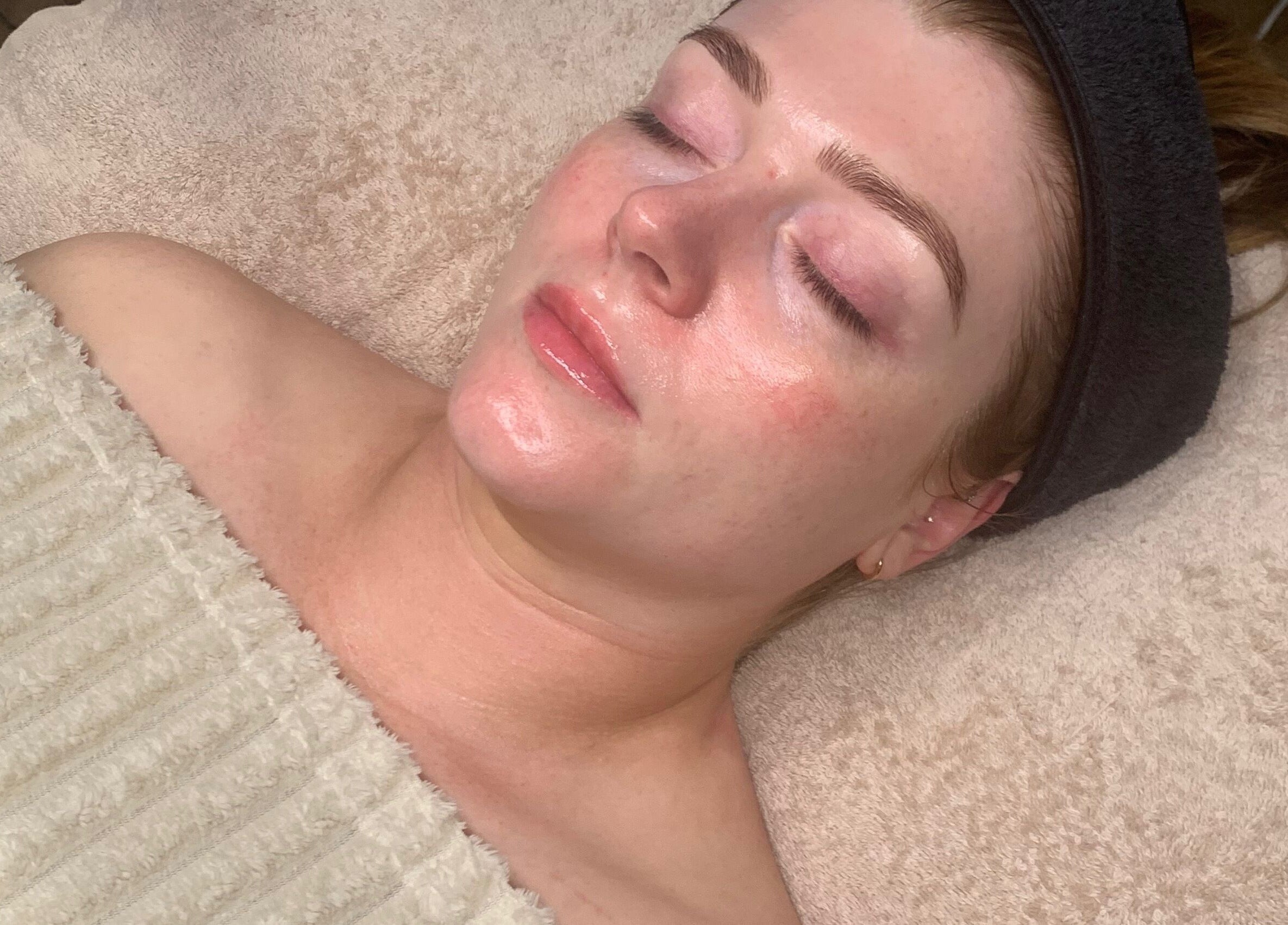 Relaxed client experiencing a calming facial at Skin Luminosity by Lydia, Southend on Sea, England, GB.