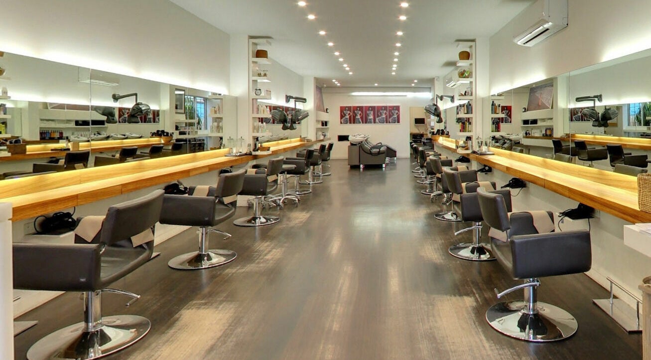 Modern salon interior at Shibui, Melbourne, Victoria, AU featuring sleek styling stations and elegant decor.