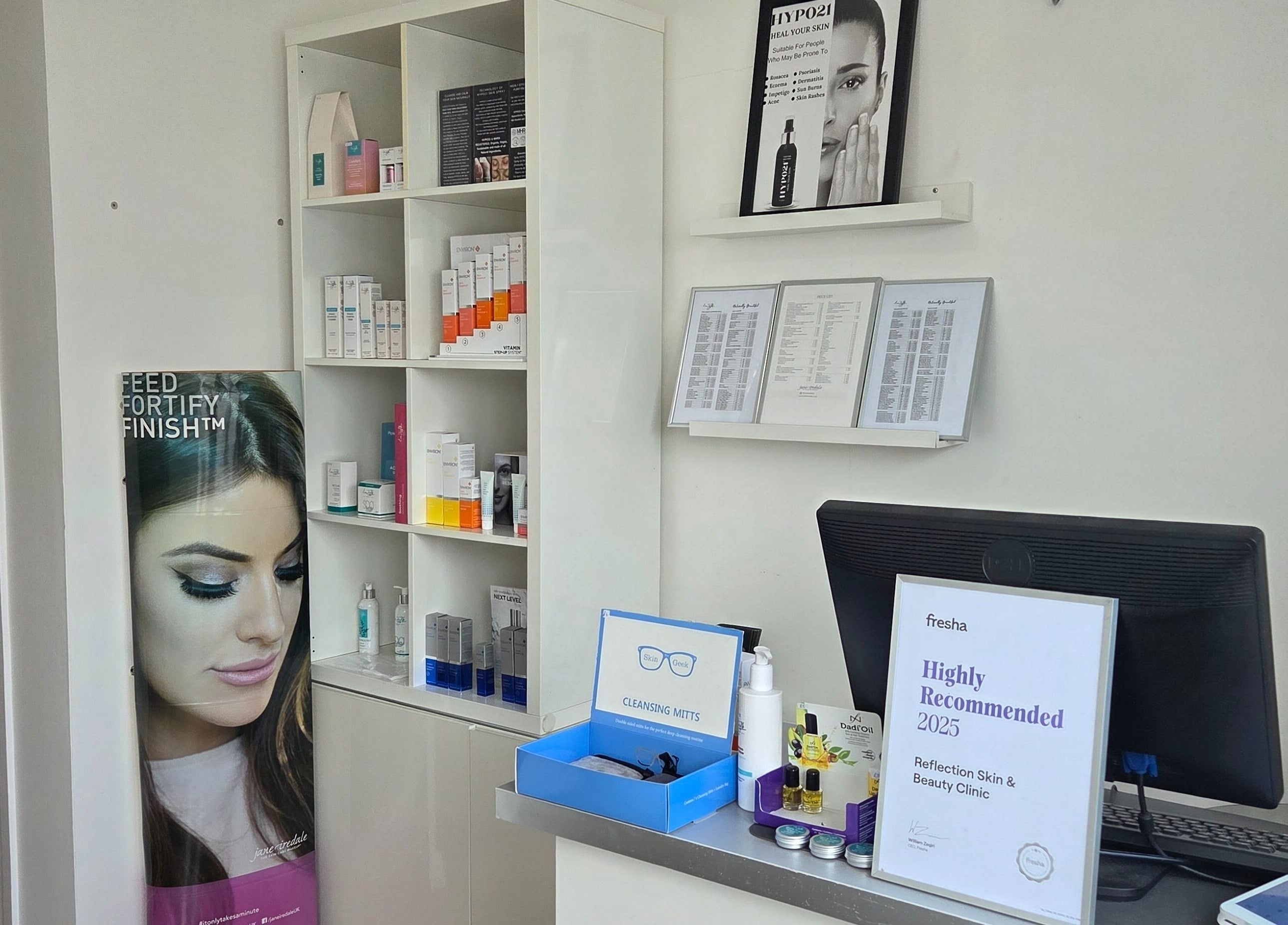 Reception area of Reflection Skin & Beauty Clinic in Westbourne, England, showcasing skincare products.