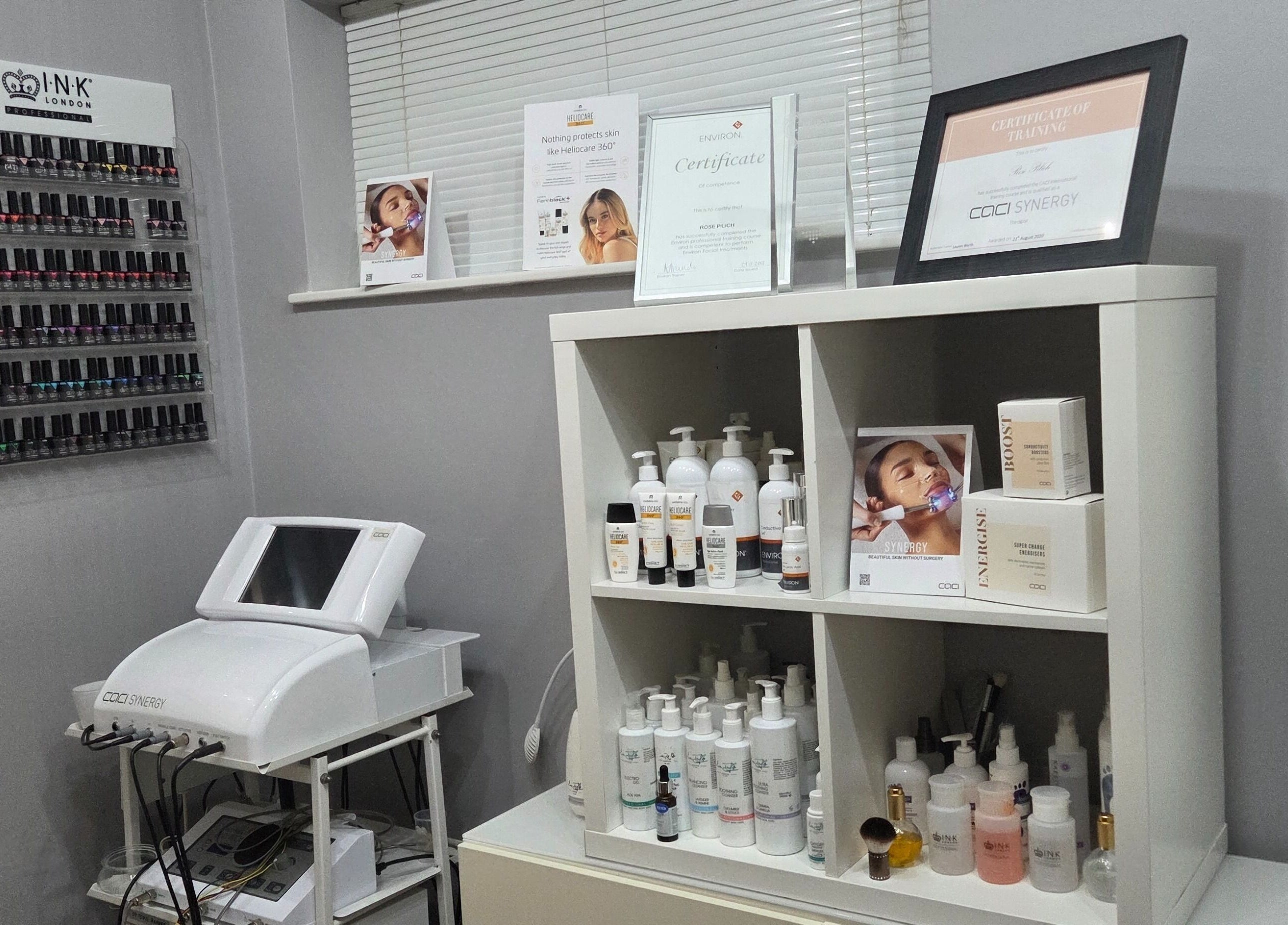 Interior of Reflection Skin & Beauty Clinic in Westbourne, England, featuring skincare products and equipment.