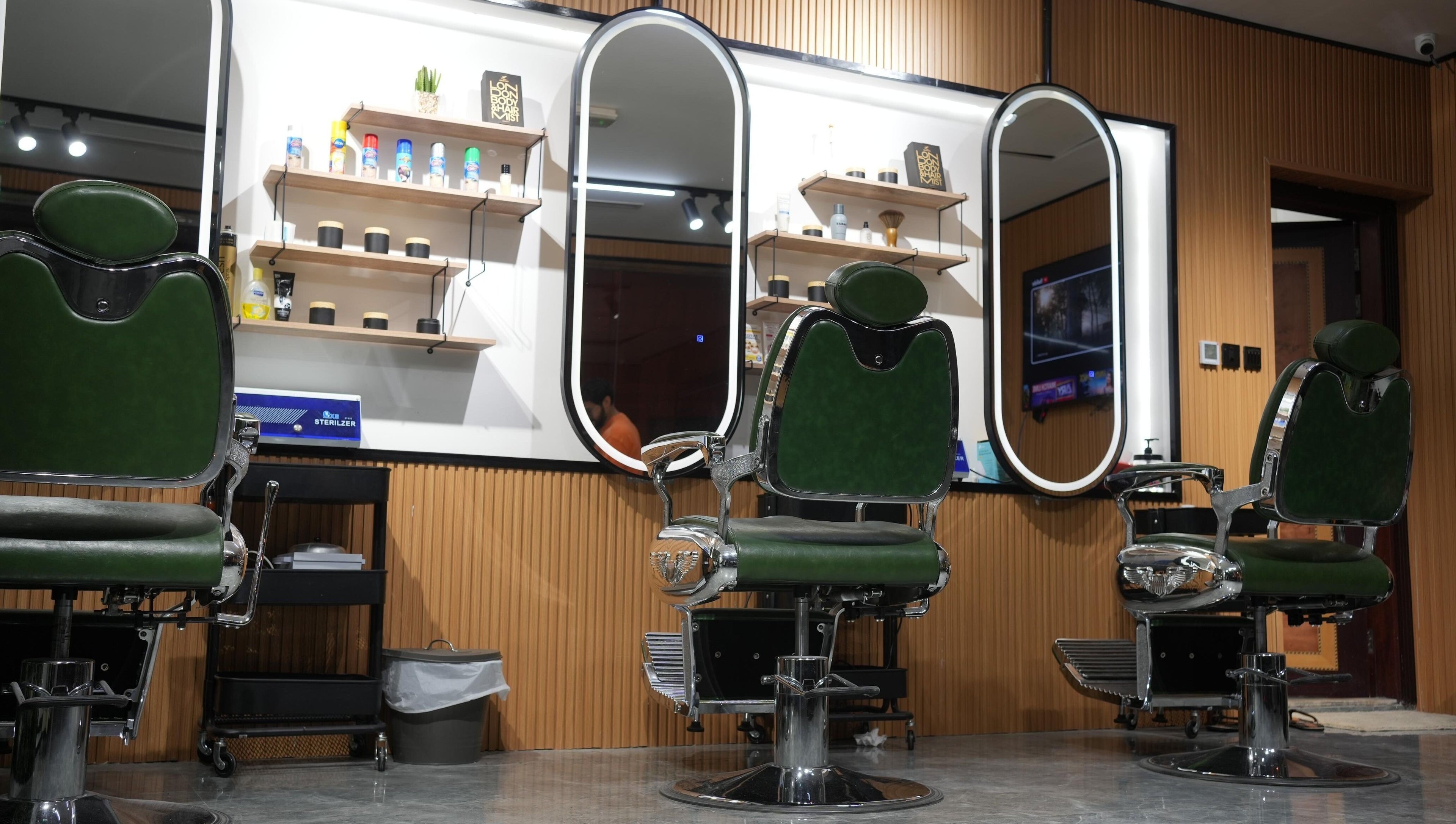 Interior of Sharb and Maqas Barbershop - صالون شارب و مقص للرجال, sleek chairs, Sharjah, Sharjah, AE.