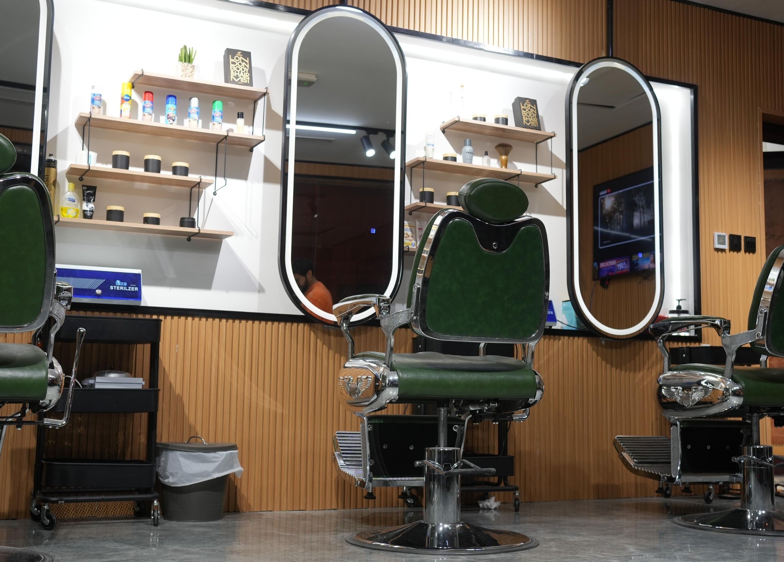 Interior of Sharb and Maqas Barbershop - صالون شارب و مقص للرجال, sleek chairs, Sharjah, Sharjah, AE.