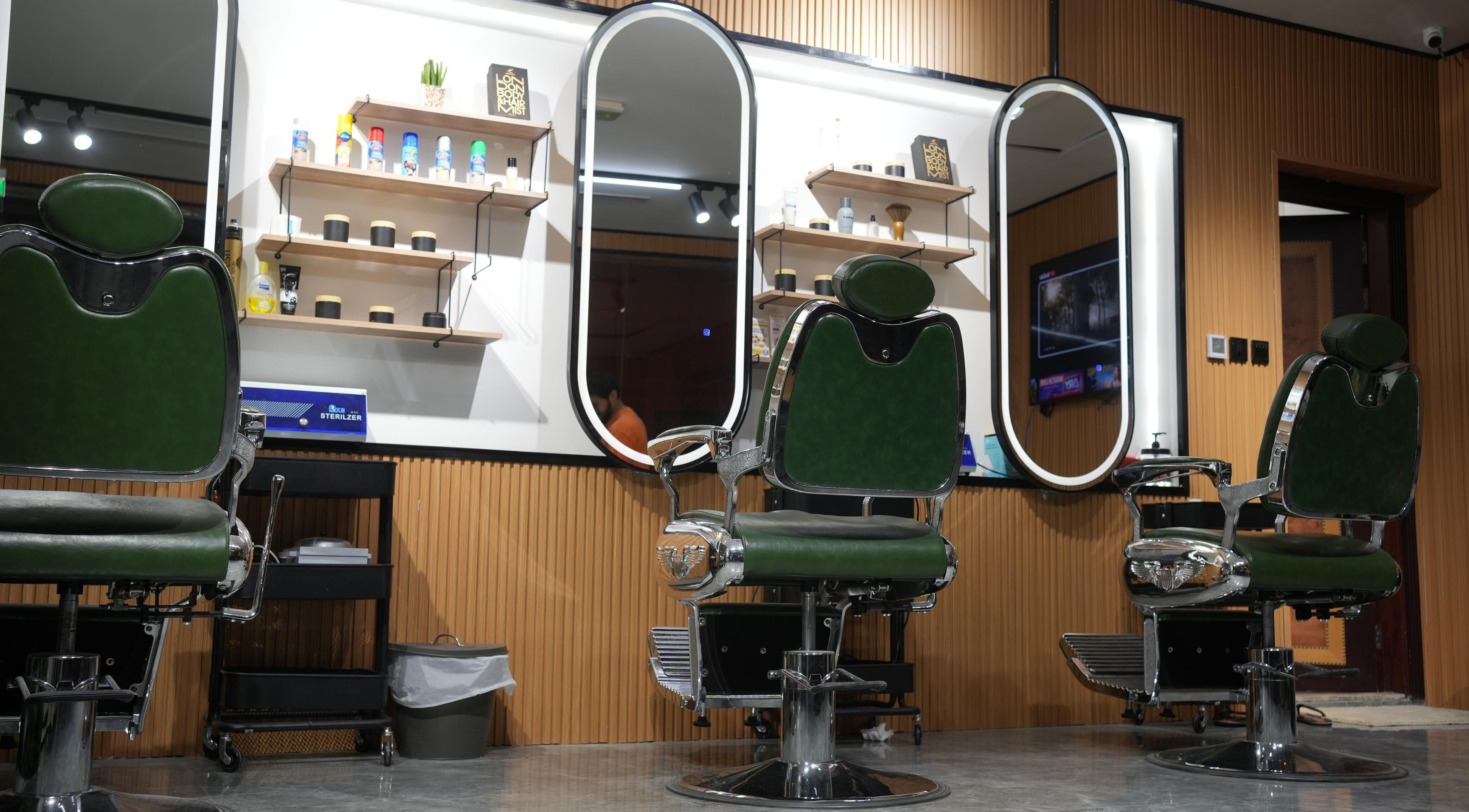 Interior of Sharb and Maqas Barbershop - صالون شارب و مقص للرجال, sleek chairs, Sharjah, Sharjah, AE.