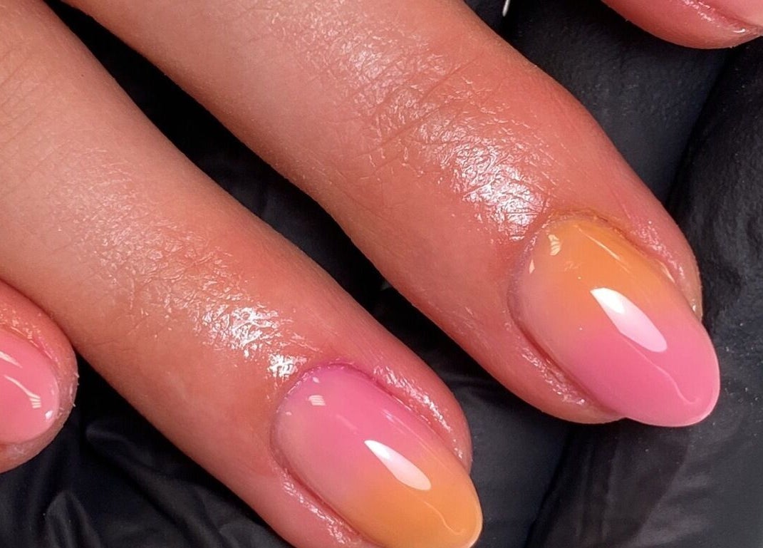 Beautiful sunset ombre manicure at The Beauty Studio by Abbie in Delph, England, GB. Experience vibrant nail art.