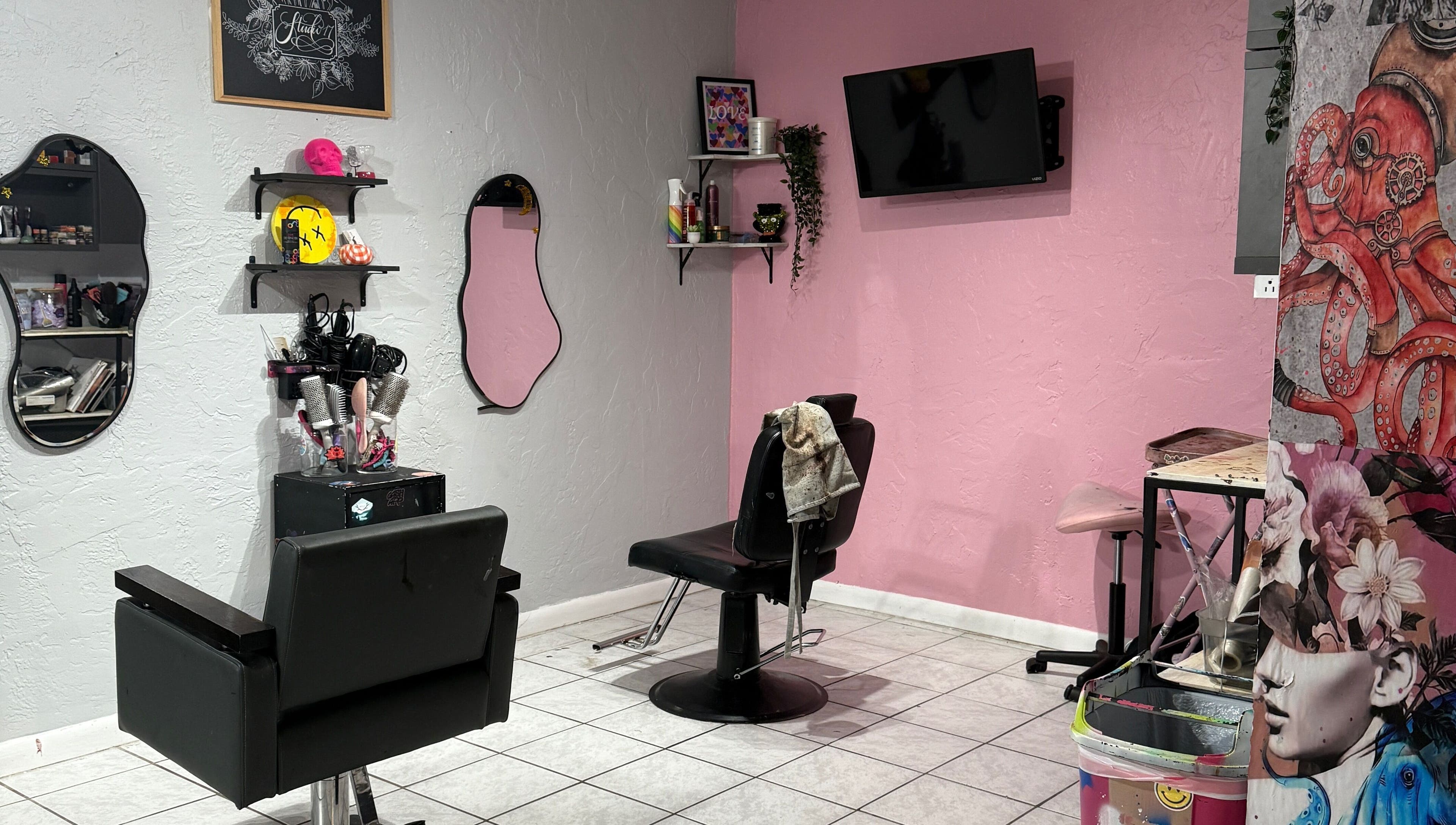 Modern salon area at Studio 17, Cutler Bay, Florida, US with stylish decor and professional styling chairs.