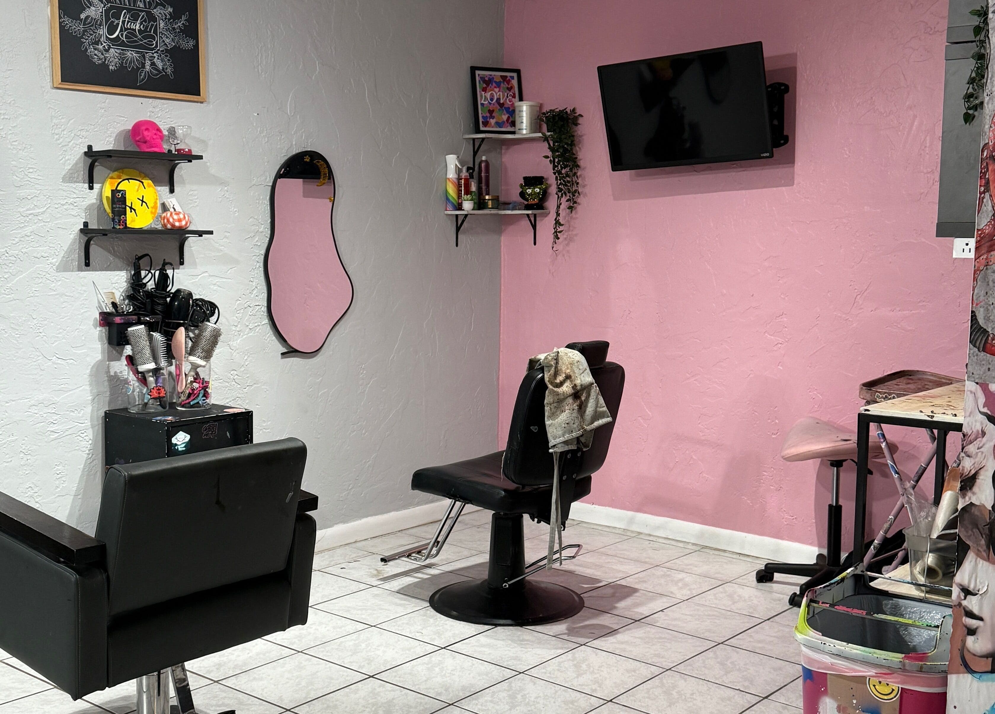 Modern salon area at Studio 17, Cutler Bay, Florida, US with stylish decor and professional styling chairs.