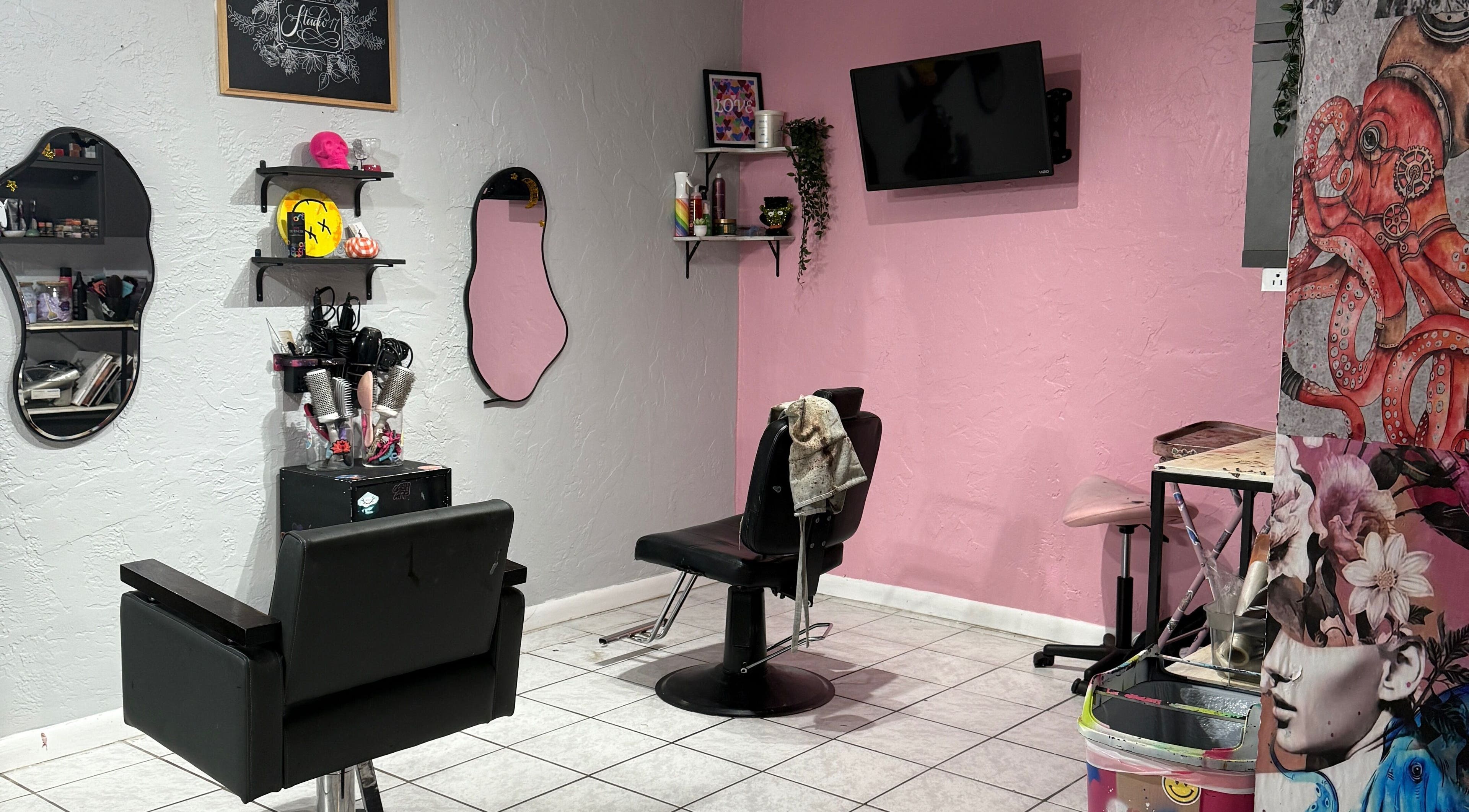 Modern salon area at Studio 17, Cutler Bay, Florida, US with stylish decor and professional styling chairs.