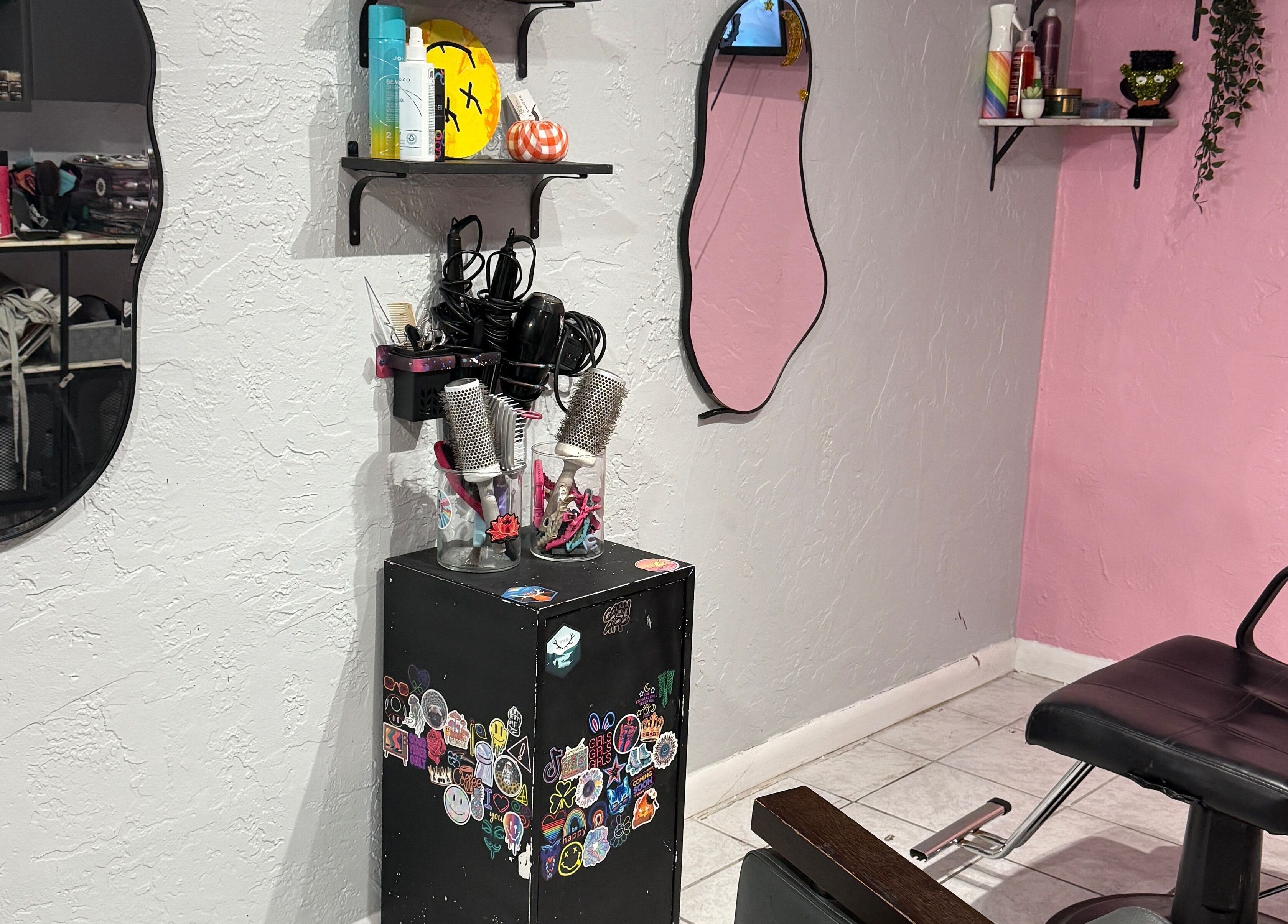 Studio 17 salon station with mirrors and styling tools in Cutler Bay, Florida, US.