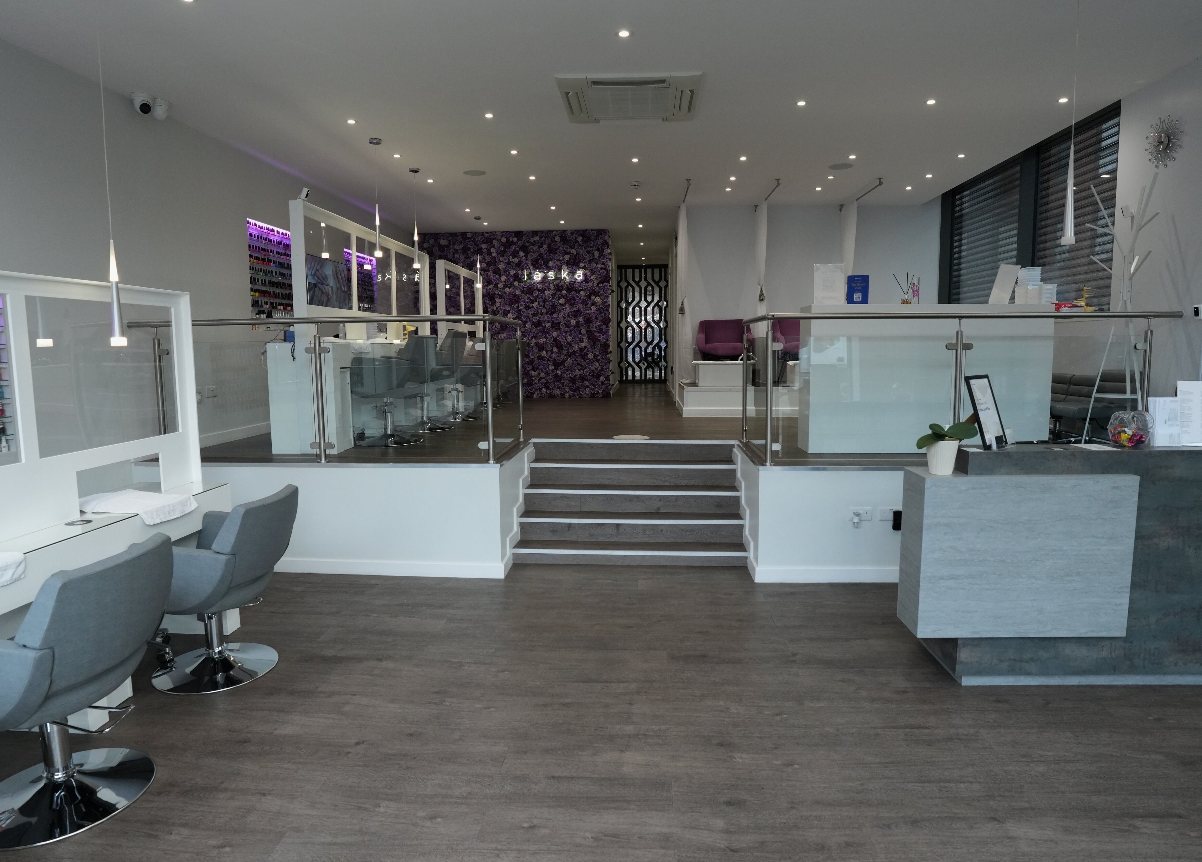 Interior of Laska By Mira in Colindale, England, featuring sleek chairs and a modern reception area.