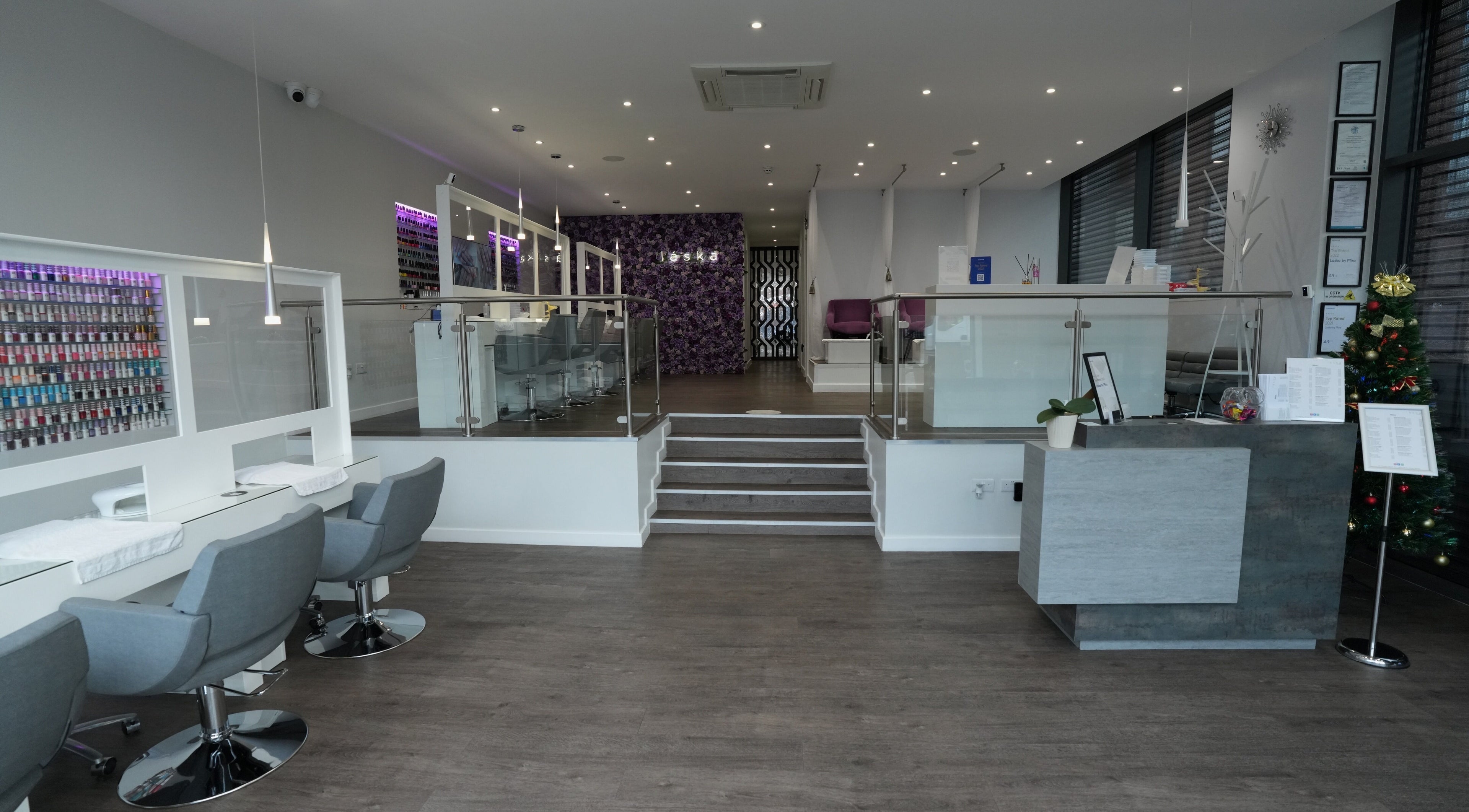 Interior of Laska By Mira in Colindale, England, featuring sleek chairs and a modern reception area.