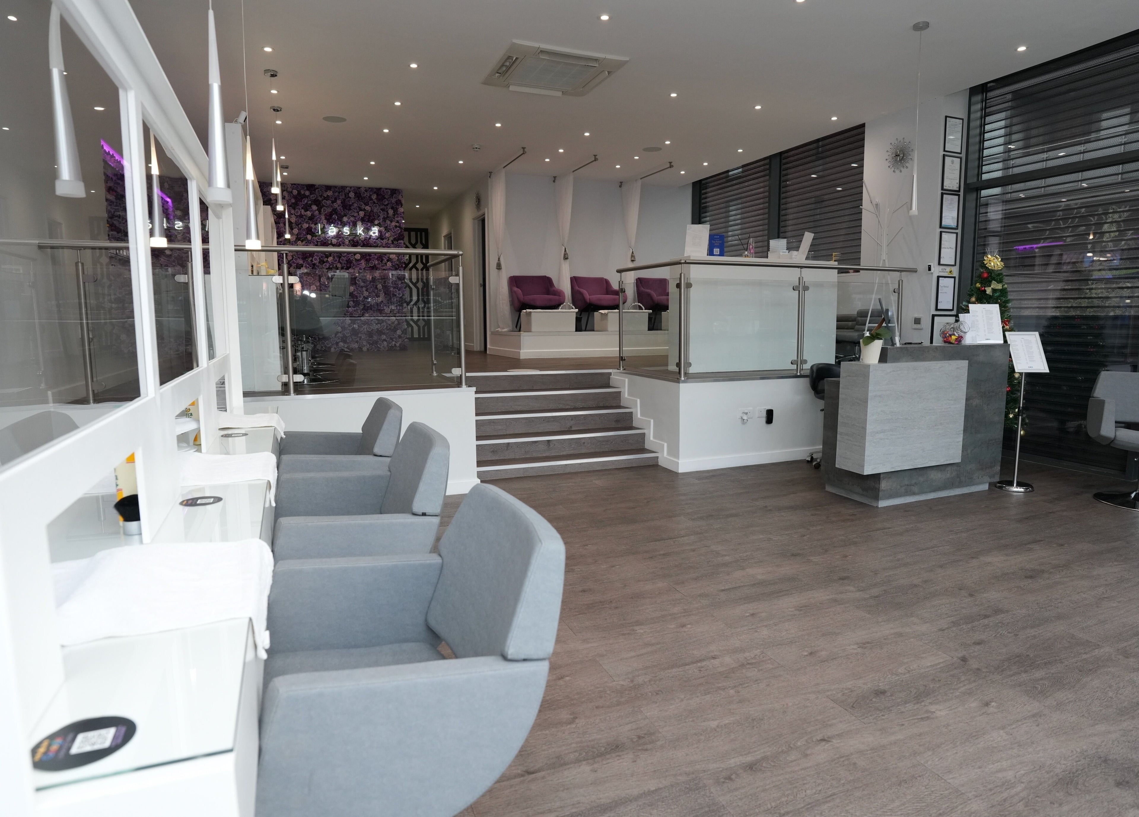 Spacious and modern interior of Laska By Mira in Colindale, England, GB, featuring sleek design and plush seating.