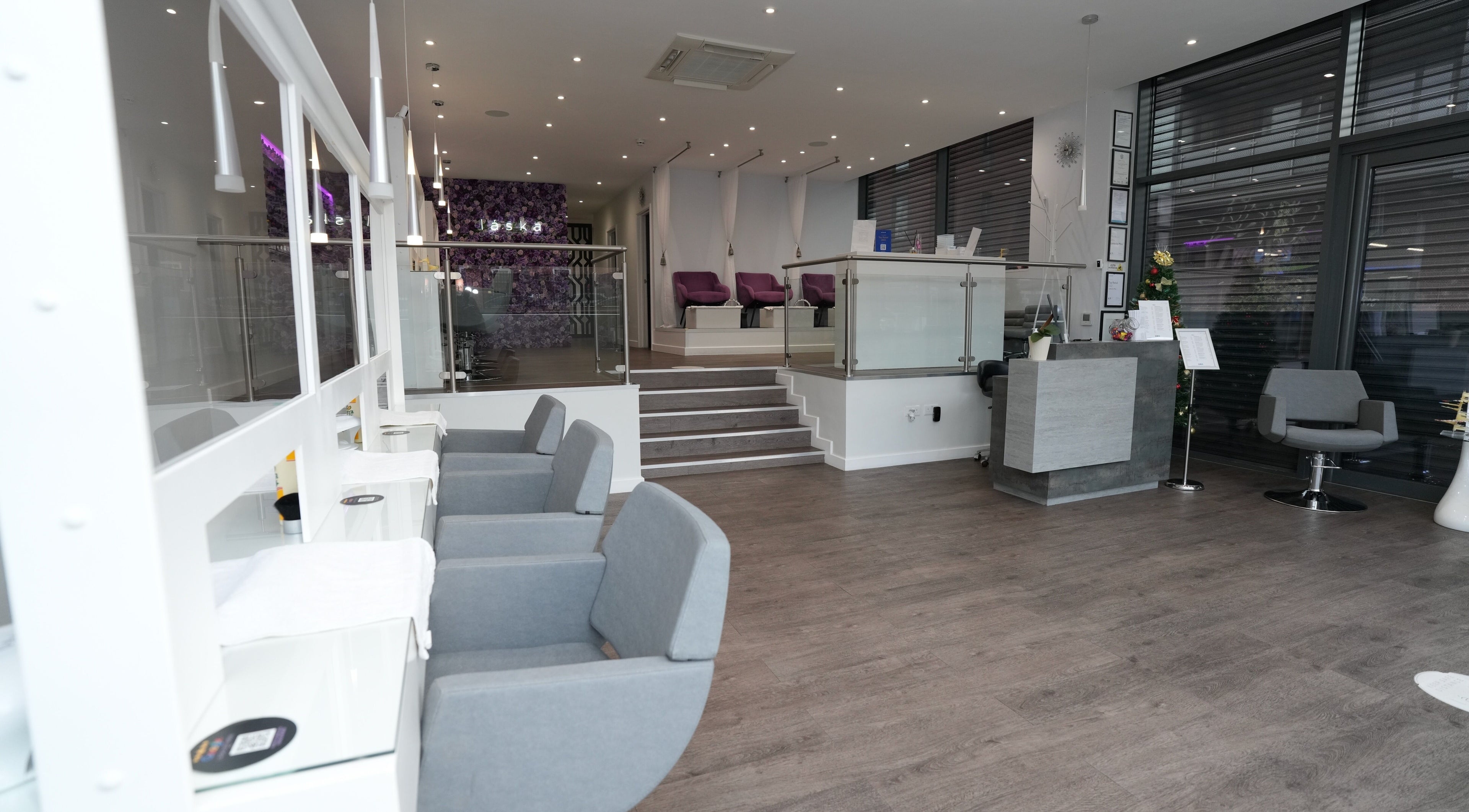 Spacious and modern interior of Laska By Mira in Colindale, England, GB, featuring sleek design and plush seating.