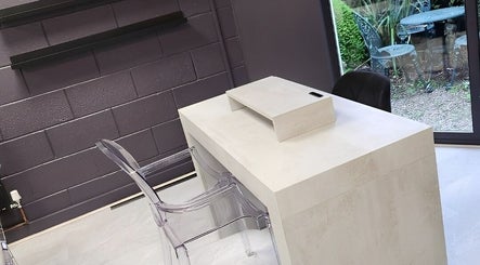Modern nail desk setup at Salon Underground, Longridge, England, GB with garden view.