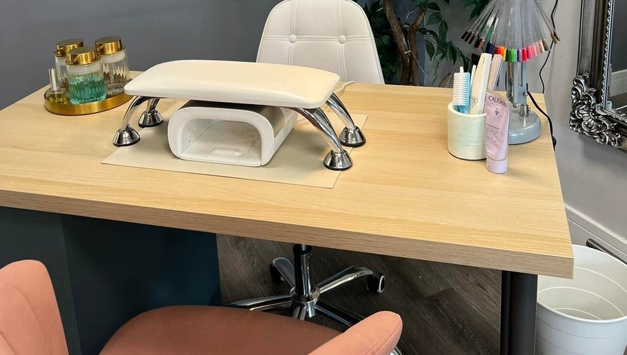 Manicure station at Atmillies in Scunthorpe, England, GB features a sleek table setup with nail tools.