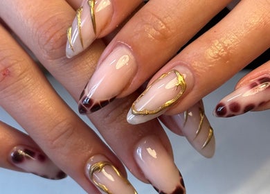 Elegant nail art with gold and dark accents by Atmillies, Scunthorpe, England, GB.