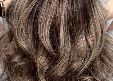 Beautiful wavy hair styled at The White Hair, Barnsley, England, GB showcasing expert color and texture.