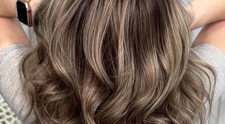 Beautiful wavy hair styled at The White Hair, Barnsley, England, GB showcasing expert color and texture.