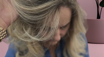 Close-up of styled blonde hair at The White Hair in Barnsley, England, GB. Elegant and chic.