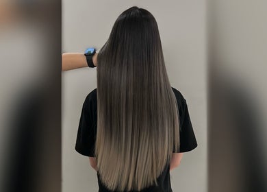 Long sleek hair styling at Cosmo Hair Salon, Melbourne, Victoria, AU showcases expert salon techniques.