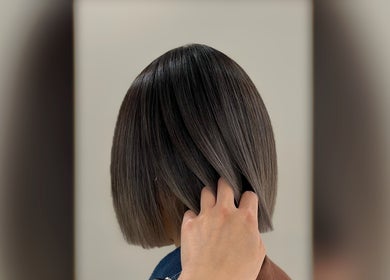 Sleek bob haircut at Cosmo Hair Salon, Melbourne, Victoria, AU showcasing modern styling.